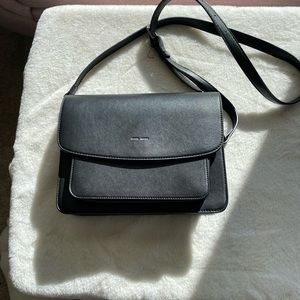 Black purse with shoulder strap